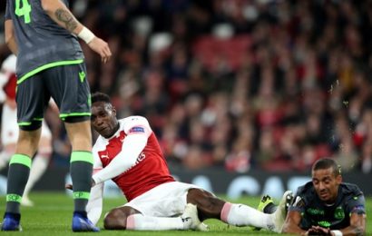 Arsenal Through to Knock Out Rounds, but Lose Welbeck to Injury
