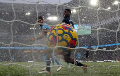 Manchester City Defeat Hammers Amid Driving Snow